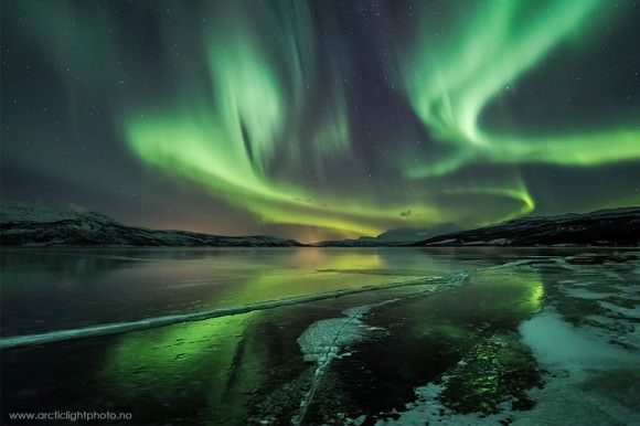 While the cause of auroras is understood, what causes the swirl shapes is an open question. University of Alaska researchers at Poker Flat hope to find an answer. Aurora photographed on Dec. 15, 2012 from Tromso, Norway. Credit: Ole Salomonsen