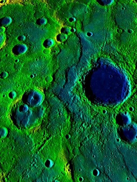 This image shows a long collection of ridges and scarps on the planet Mercury called a fold-and-thrust belt. The belt stretches over 336 miles (540 km). The colors correspond to elevation—yellow-green is high and blue is low. Image courtesy NASA/Johns Hopkins University Applied Physics Laboratory/Carnegie Institution of Washington.
