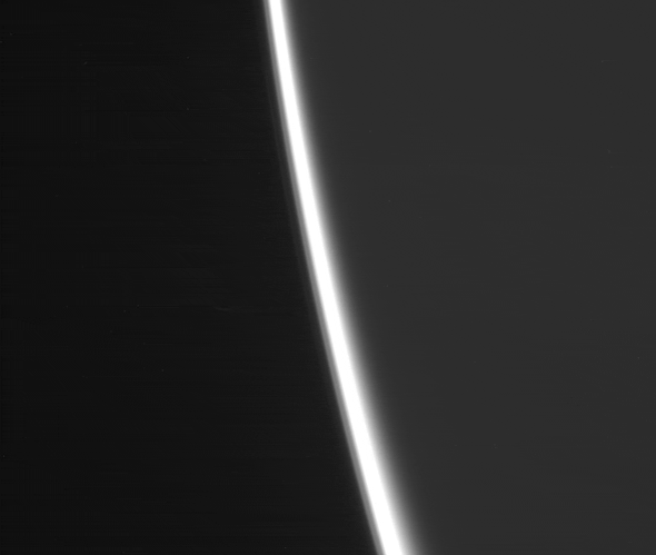 Two of Saturn's moons drift into the scene on March 11, 2014 (NASA/JPL-Caltech/SSI. Animation by Jason Major.)