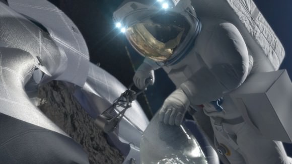 An astronaut retrieves a sample from an asteroid in this artist's conception. Credit: NASA