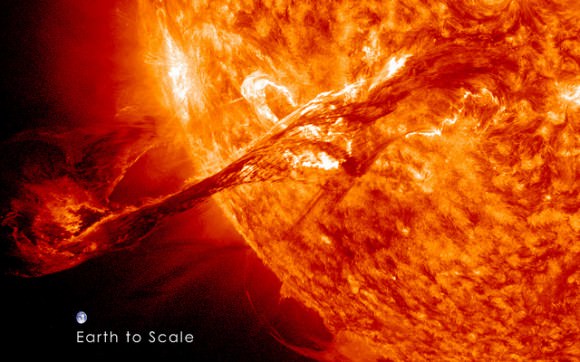 On August 31, 2012 a long filament of solar material that had been hovering in the sun's atmosphere, the corona, erupted out into space at 4:36 p.m. EDT. The coronal mass ejection, or CME, traveled at over 900 miles per second. The CME did not travel directly toward Earth, but did connect with Earth's magnetic environment, or magnetosphere, causing aurora to appear on the night of Monday, September 3. The image above includes an image of Earth to show the size of the CME compared to the size of Earth. Credit: NASA/GSFC/SDO