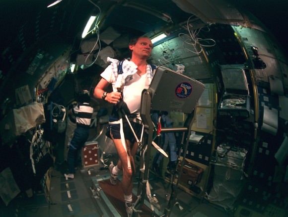 NASA astronaut Norm Thagard exercises aboard the Russian Mir space station in 1995. Thagard was the first American to launch into space aboard a Soyuz and spent what was then a record-breaking 115 days in space. Credit: NASA