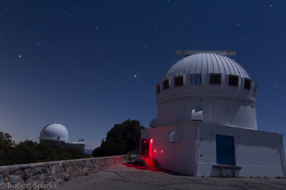 Mars and Spica rising over the telescope domes at Kitt Peak, Arizona. The 2.1 metre dome is on the left, and the 0.9 metre dome is to the right. Credit-Rob Sparks @halfastro