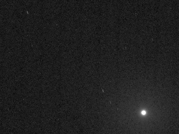 NASA's Curiosity Mars rover has caught the first image of asteroids taken from the surface of Mars. The image includes two asteroids, Ceres and Vesta.  In this unannotated version of the 12-second-exposure image, the brightness of Deimos at lower right saturates the image, making the moon appear overly large.  Credit: NASA/JPL-Caltech/MSSS/Texas A&M