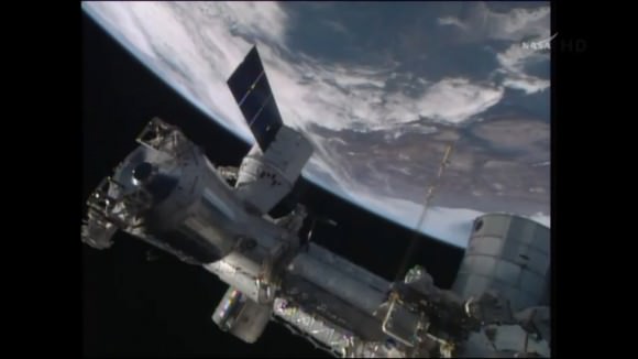 SpaceX Dragon resupply spacecraft arrives for successful berthing and docking at the International Space Station on Easter Sunday morning April 20, 2014. Credit: NASA TV