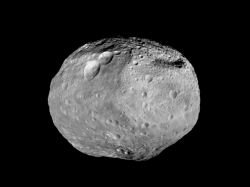 Mosaic synthesizes some of the best views the spacecraft had of the giant asteroid Vesta. Dawn studied Vesta. The towering mountain at the south pole - more than twice the height of Mount Everest - is visible at the bottom of the image. The set of three craters known as the "snowman" can be seen at the top left. Credit: NASA/JPL-Caltech/UCAL/MPS/DLR/IDA
