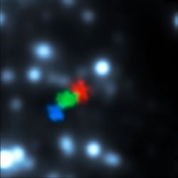  Shown here are VLT observations from 2006, 2010 and 2013, colored blue, green and red respectively showing a gas cloud being ripped apart by the supermassive black hole at the center of the galaxy. Credit: ESO/S. Gillessen.