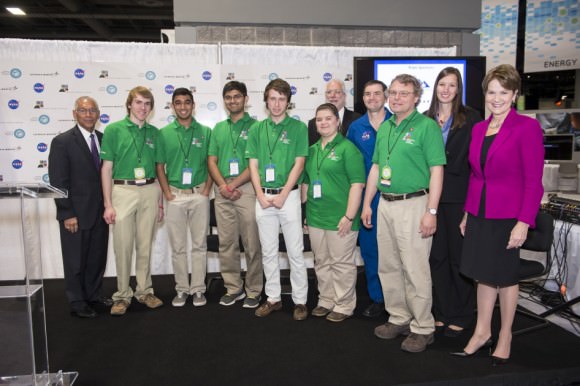 Exploration Design Challenge Winning Team   NASA’s Administrator, Charles Bolden (left), President/CEO of Lockheed Martin, Marillyn Hewson (right), and astronaut Rex Walheim (back row) pose for a group photo with the winning high school team in the Exploration Design Challenge. Team ARES from the Governors School for Science and Technology in Hampton, Va. won the challenge with their radiation shield design, which will be built and flown aboard the Orion/EFT-1. The award was announced at the USA Science and Engineering Festival on April 25, 2014 at the Washington Convention Center.  Credit: NASA/Aubrey Gemignani