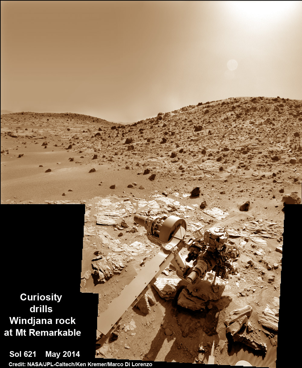 Composite photo mosaic shows deployment of NASA Curiosity rovers robotic arm and two holes after drilling into ‘Windjana’ sandstone rock on May 5, 2014, Sol 621, at Mount Remarkable as missions third drill target for sample analysis by rover’s chemistry labs.  The navcam raw images were stitched together from several Martian days up to Sol 621, May 5, 2014 and colorized.   Credit: NASA/JPL-Caltech/Ken Kremer - kenkremer.com/Marco Di Lorenzo 