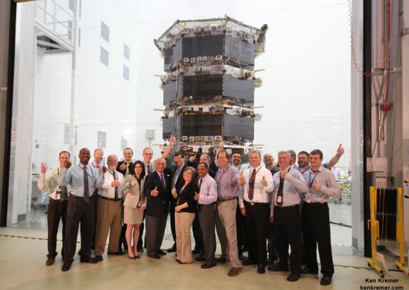 NASA Administrator Charles Bolden poses with the agency’s Magnetospheric Multiscale (MMS) spacecraft, mission personnel, Goddard Center Director Chris Scolese and NASA Associate Administrator John Grunsfeld, during visit to the cleanroom at NASA's Goddard Space Flight Center in Greenbelt, Md., on May 12, 2014.  Credit: Ken Kremer- kenkremer.com