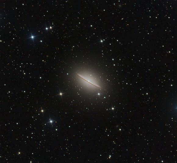 A expanded view of M104, the Sombrero Galaxy and the surrounding region. Credit and copyright: Ian Sharp.  