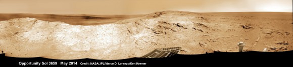 NASA’s Opportunity Mars rover captures sweeping panoramic vista near the ridgeline of 22 km (14 mi) wide Endeavour Crater's western rim. The center is southeastward and the distant rim is visible in the center. An outcrop area targeted for the rover to study is at right of ridge.  This navcam panorama was stitched from images taken on May 10, 2014 (Sol 3659) and colorized.  Credit: NASA/JPL/Cornell/Marco Di Lorenzo/Ken Kremer-kenkremer.com