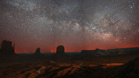Monument Valley in Utah under the starry night sky on May 27, 2014. Credit and copyright: César Cantú.