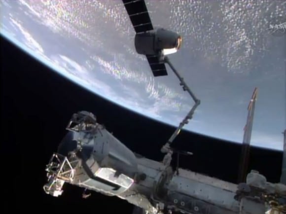 The SpaceX Dragon commercial cargo craft was in the grips of the Canadarm2 before being released for a splashdown in the Pacific Ocean.  Credit: NASA