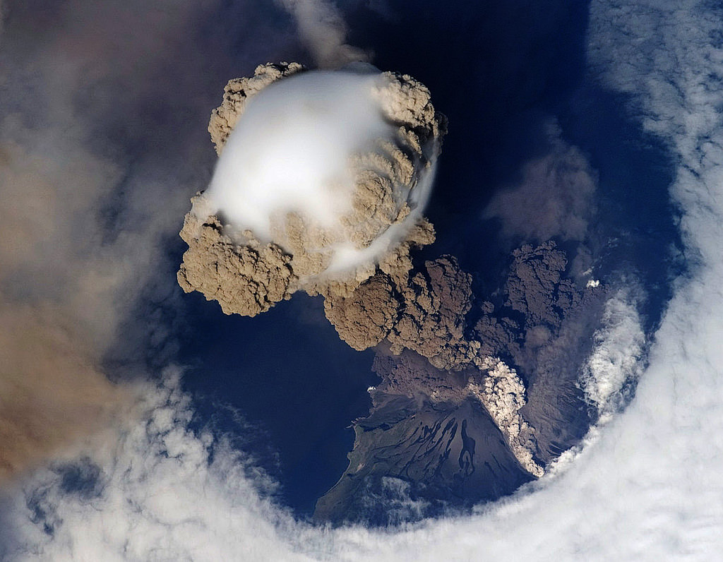 The Sarychev Volcano in Japan erupting in 2009. On an asteroid, volcanoes would not form these types of domes and would likely be more like seepages. Credit: NASA/JSC/Image Science and Analysis Laboratory