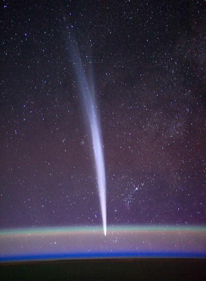 Comet Lovejoy passing behind green oxygen and sodium airglow layers on December 22, 2011 seen from the space station. Credit: NASA/Dan Burbank