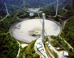 Aerial view of the 1,000-foot dish at Arecibo Observatory. Credit: NOAA