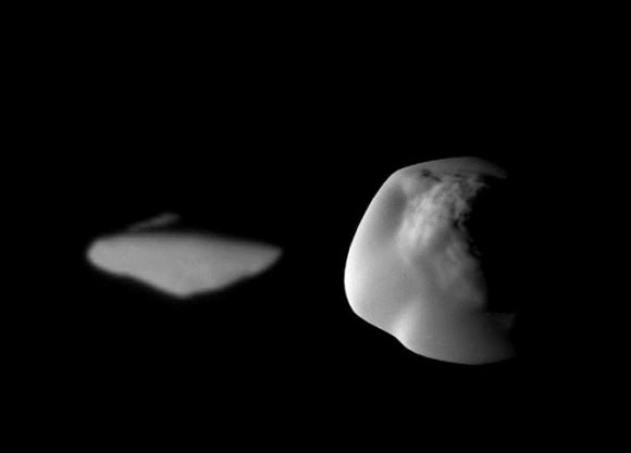 Saturn's moon Atlas. Left image: viewed from the side, at a scale of 0.6 miles (1 km) per pixel. Right image: the mid-southern latitudes, at 820 feet (250 m) per pixel. The images are composite views from the Cassini spacecraft. Credit: NASA/JPL/SSI