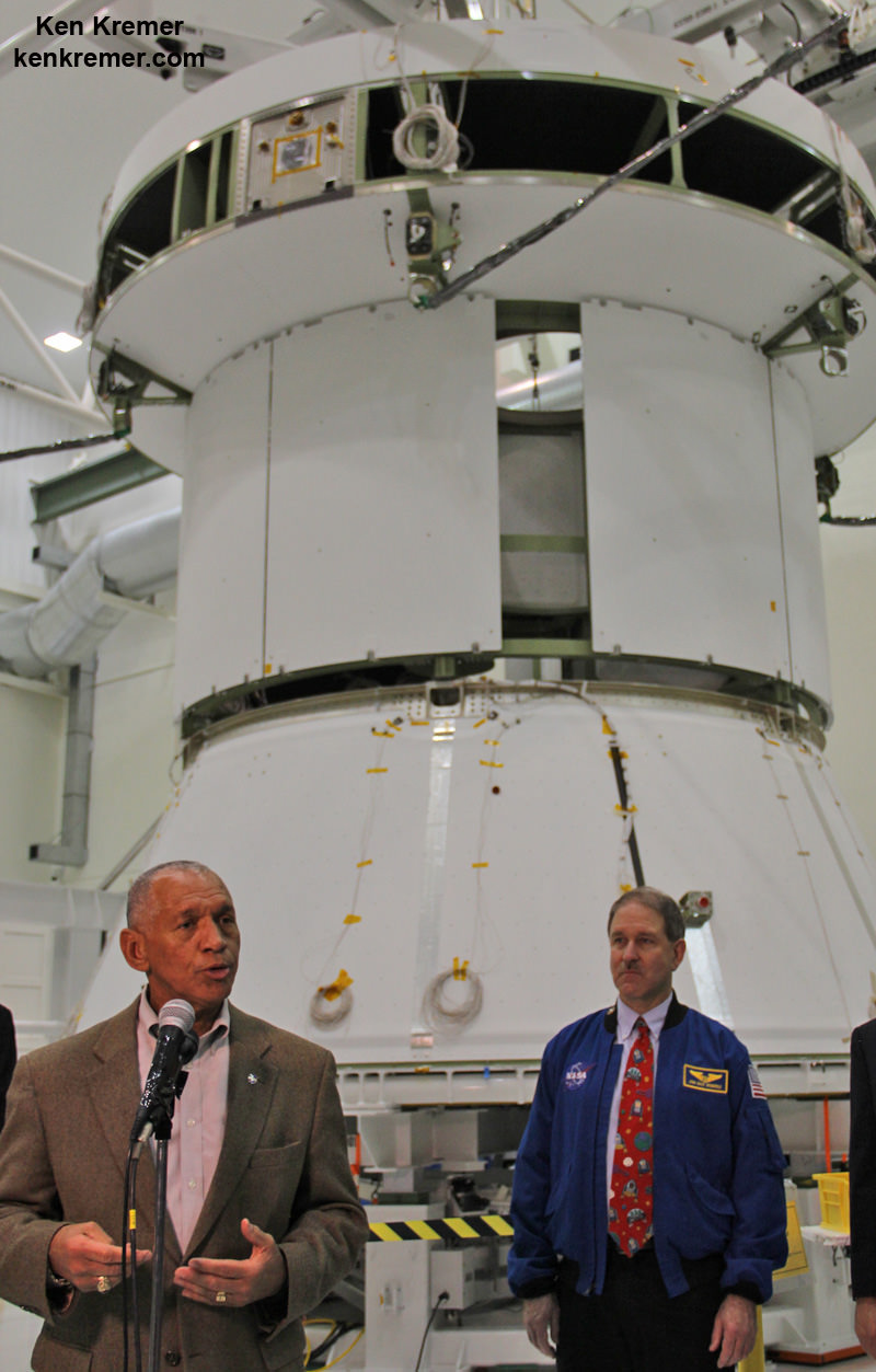 NASA Administrator Charles Bolden and science chief Astronaut John Grunsfeld discuss NASA’s human spaceflight initiatives backdropped by the service module for the Orion crew capsule being assembled at the Kennedy Space Center. Credit: Ken Kremer/kenkremer.com 