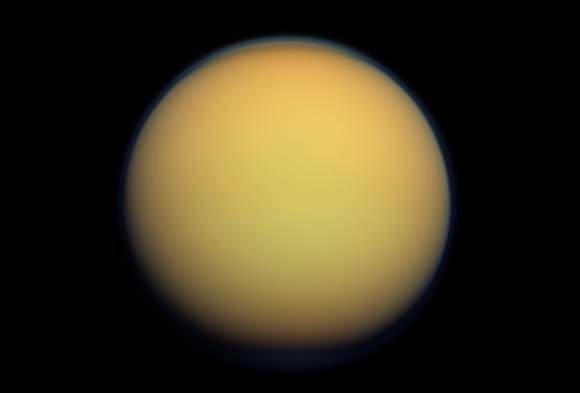 Titan's atmosphere makes Saturn's largest moon look like a fuzzy orange ball in this natural-color view from the Cassini spacecraft. Cassini captured this image in 2012. Image Credit: NASA/JPL-Caltech/Space Science Institute