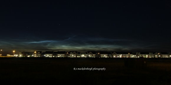 Noctilucent clouds over the city of Rosmalen, Holland, July 3, 2014. Taken with Canon 60D, 28 mm lens. Credit: Rob van Mackelenbergh