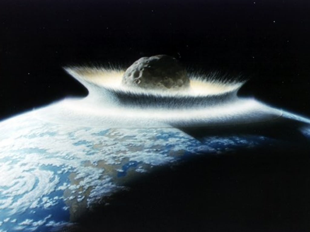 When an asteroid struck the Yucatan region about 66 million years ago, it triggered the extinction of the dinosaurs.  This artist's depiction is a large exaggeration of the actual size of the 6 mile wide object, but shows the force such an impact could have.