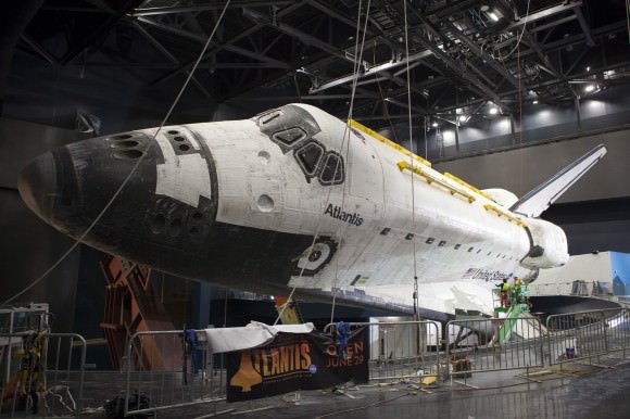 Atlantis is placed into its permanent home -- an exhibit at the Kennedy Space Center -- which opened in 2013. Credit: NASA