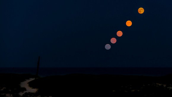 Supermoon timelapse composite on August 10 near the ship mast at Barnegat Light on Long Beach Island, New Jersey. Credit and copyright: FrankM301 on Flickr.