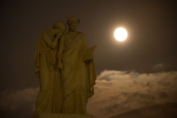 A perigree full moon or supermoon is seen over the The Peace Monument on the grounds of the United States Capitol, Sunday, August 10, 2014, in Washington. A supermoon occurs when the moon’s orbit is closest (perigee) to Earth at the same time it is full. Credit: (NASA/Bill Ingalls)