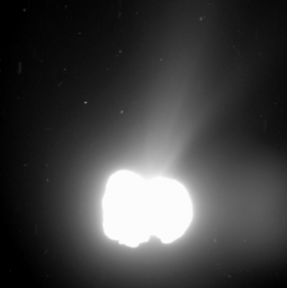 Comet 67P/Churyumov-Gerasimenko activity on 2 August 2014. The IMAGE was taken by Rosetta’s OSIRIS wide-angle camera from a distance of 550 km. The exposure time of the image was 330 seconds and the comet nucleus is saturated to bring out the detail of the comet activity. Note there is a ghost image to the right. The image resolution is 55 metres per pixel. Credits: ESA/Rosetta/MPS for OSIRIS Team MPS/UPD/LAM/IAA/SSO/INTA/UPM/DASP/IDA