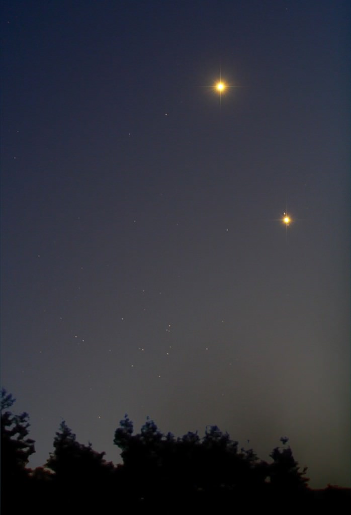 Close approach of Venus and Jupiter with M44 in the same field on August 18, 2014 over Payson, Arizona. Shot with a Canon XTi DSLR, 5 seconds exposure, ISO 400, 4" f/4.5 Newtonian. Credit and copyright: Chris Schur. 