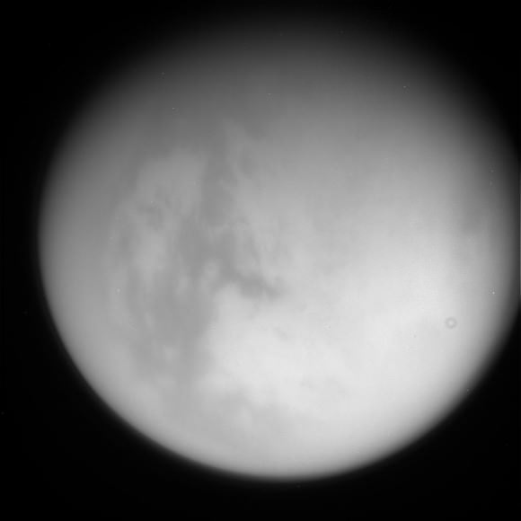 A raw view of Titan taken by the Cassini spacecraft Aug. 13, 2014. Credit: NASA/JPL/Space Science Institute