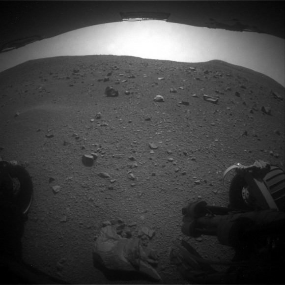 Two of Opportunity's six wheels are visible in this shot from the rear hazcam on Sol 3,780, taken on Mars in September 2014. Credit: NASA/JPL-Caltech/Cornell Univ./Arizona State Univ. 