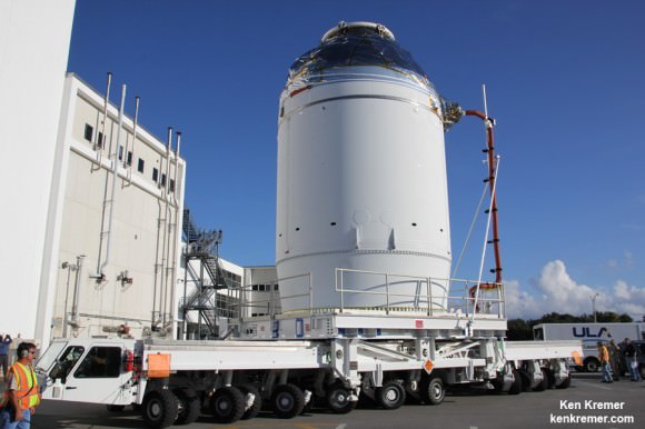 NASA’s completed Orion EFT 1 crew module loaded on wheeled transporter during move to Launch Abort System Facility (LASF) on Sept. 11, 2014 at the Kennedy Space Center, FL.  Credit: Ken Kremer - kenkremer.com  