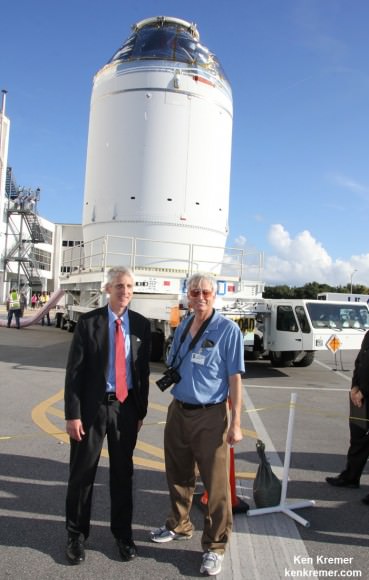Scott Wilson, NASA’s Orion Manager of Production Operations at KSC and Ken Kremer/Universe Today discuss Orion EFT-1 mission during capsule rollout on Sept. 11, 2014 at the Kennedy Space Center, FL.  Credit: Ken Kremer - kenkremer.com 