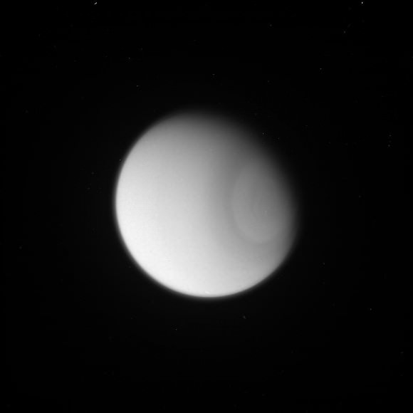 Atmospheric features on Saturn's moon Titan appear to be faintly visible in this raw image taken by the Cassini spacecraft Sept. 10, 2014. Credit: NASA/JPL/Space Science Institute 