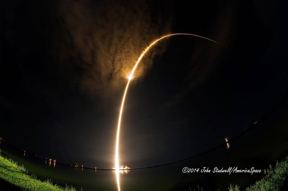 Stunning “streak” effect, with high-level clouds illuminated, during first-stage flight of SpaceX Falcon 9 rocket with AsiaSat 6 on Sept. 7, 2014 from Cape Canaveral, FL. Credit: John Studwell/AmericaSpace