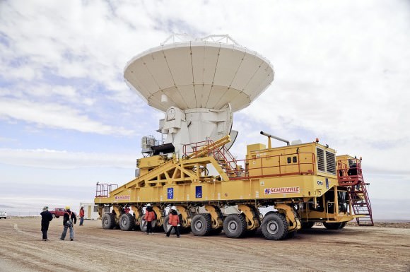 The 130 ton German Antenna Dish Transporter, nicknamed Otto. The ALMA transporter vehicle carefully carries the state-of-the-art antenna, with a diameter of 12 metres and a weight of about 100 tons, on the 28 km journey to the Array Operations Site, which is at an altitude of 5000 m. The antenna is designed to withstand the harsh conditions at the high site, where the extremely dry and rarefied air is ideal for ALMA’s observations of the universe at millimetre- and sub-millimetre-wavelengths. (Credit: ESO)