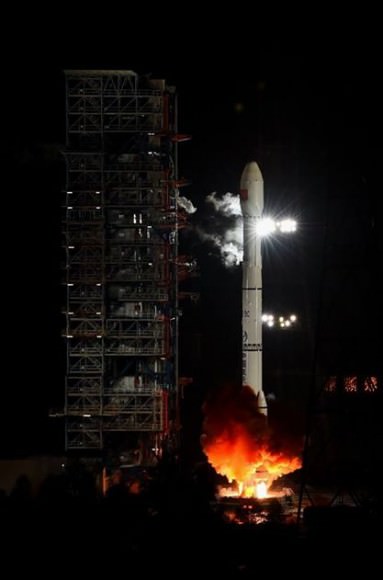 Ignition and liftoff of the unmanned Chang'e 5 T1 lunar spacecraft atop a Long March-3C rocket from the Xichang Satellite Launch Center in China on Oct. 24, 2014, BJT (Oct. 23 EDT).  Credit: Xinhua/Jiang Hongjing