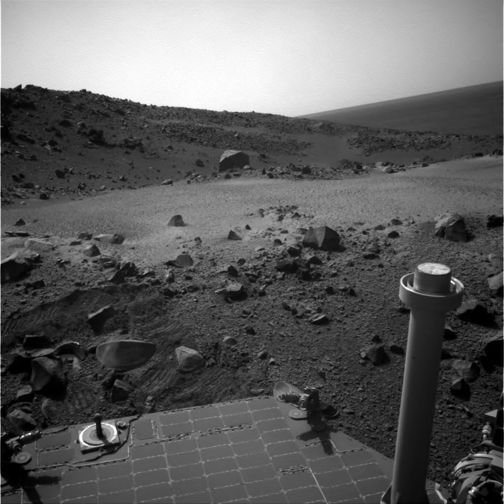 A view from the Opportunity rover on Mars, which explored the rim of Endeavour Crater in 2014. Picture taken on Sol 3,798 in October 2014, while the rover was en route to a small crater called Ulysses. The rover's wheels overturned some rocks while traversing the rim of the crater, and those rocks contained manganese oxides. Credit: NASA/JPL-Caltech/Cornell Univ./Arizona State Univ.