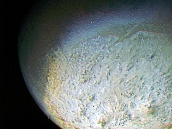 A glimpse of Triton from the Voyager 2 spacecraft, which flew by the Neptunian moon in August 1989. Credit: NASA/JPL