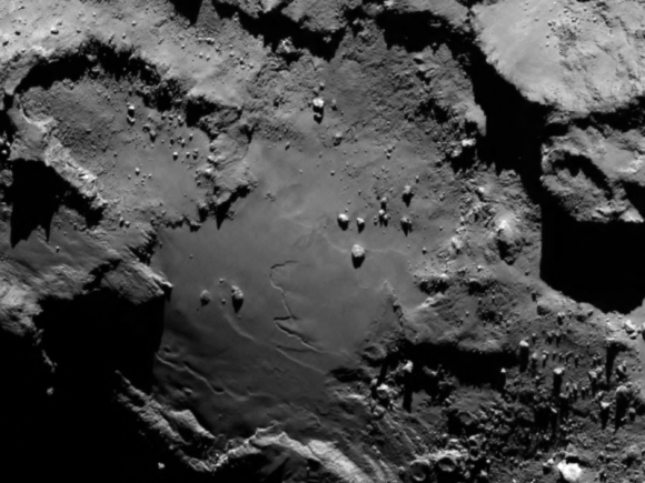 A wider field of view of 67P/Churyumov-Gerasimenko on the larger lobe, where the boulder Cheops is located. This picture was taken by the Rosetta spacecraft shortly after its arrival in August. Credit: ESA/Rosetta/MPS for OSIRIS Team MPS/UPD/LAM/IAA/SSO/INTA/UPM/DASP/IDA