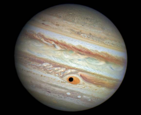 Jupiter's Great Red Spot and Ganymede's Shadow. Image Credit: NASA/ESA/A. Simon (Goddard Space Flight Center)