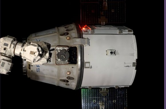 Dragon released from snares of ISS robotic arm on Oct. 25, 2014 for return to Earth.  Credit: NASA  