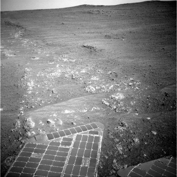 Solar panels from the Opportunity Mars rover shine against the mottled ground on Sol 3,846 in November 2014. Credit: NASA/JPL-Caltech/Cornell Univ./Arizona State Univ. 