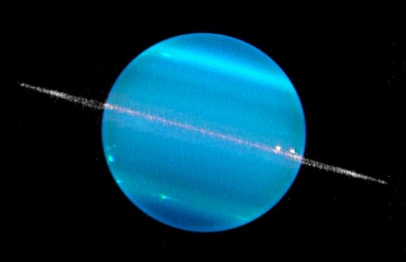 A composite image of Uranus in two infrared bands, showing the planet and its ring system. Picture taken by the Keck II telescope and released in 2007. Credit: W. M. Keck Observatory (Marcos van Dam)