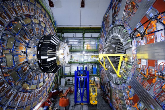 Cross-section of the Large Hadron Collider where its detectors are placed and collisions occur. LHC is as much as 175 meters (574 ft) below ground on the Frence-Swiss border near Geneva, Switzerland. The accelerator ring is 27 km (17 miles) in circumference. (Photo Credit: CERN)
