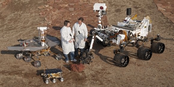 The future Chinese rover would be nearly as large as the MER rovers. Full scale models of all three NASA/JPL Mars rovers are shown here - Mars Pathfinder, MER and MSL in a JPL Mars yard with engineers.  (Photo Credit: NASA/JPL)