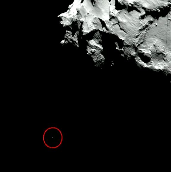 Philae falls to the craggy comet photographed by the Rosetta mothership. Credit: ESA