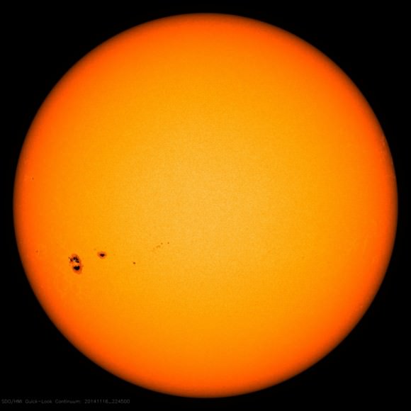 Sunspot region 2192 (lower left) has returned for an encore in this photo taken by NASA's Solar Dynamics Observatory. The same group is visible in images taken 4 days earlier from Mars. Credit: NASA/SDO